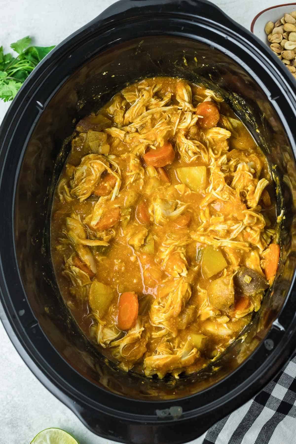 cooked shredded chicken mixed through curry sauce