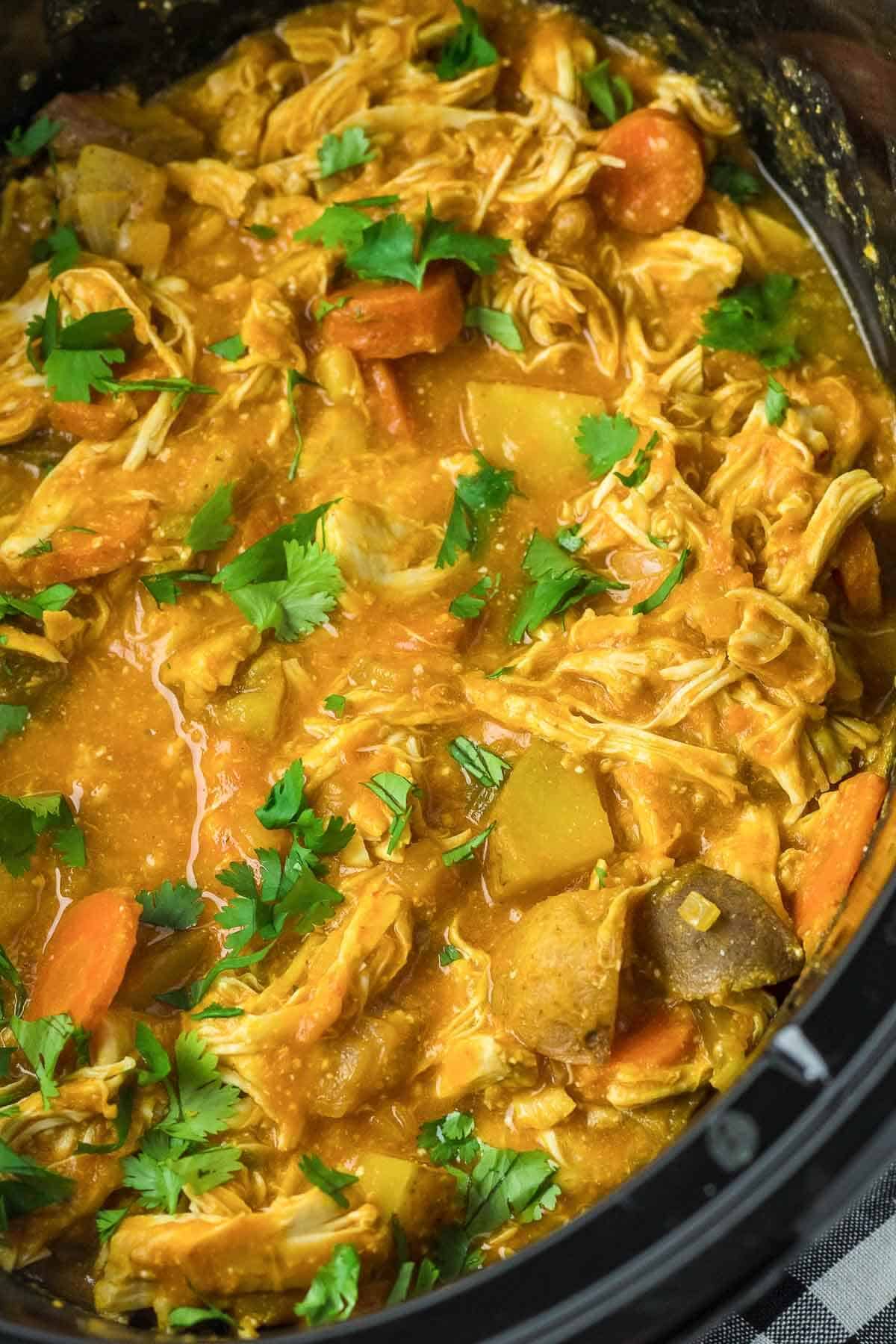 slow cooker thai red curry in pot close up