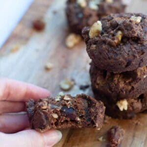hand holding a chocolate date cookie