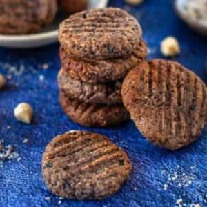 scattered cookies on blue background