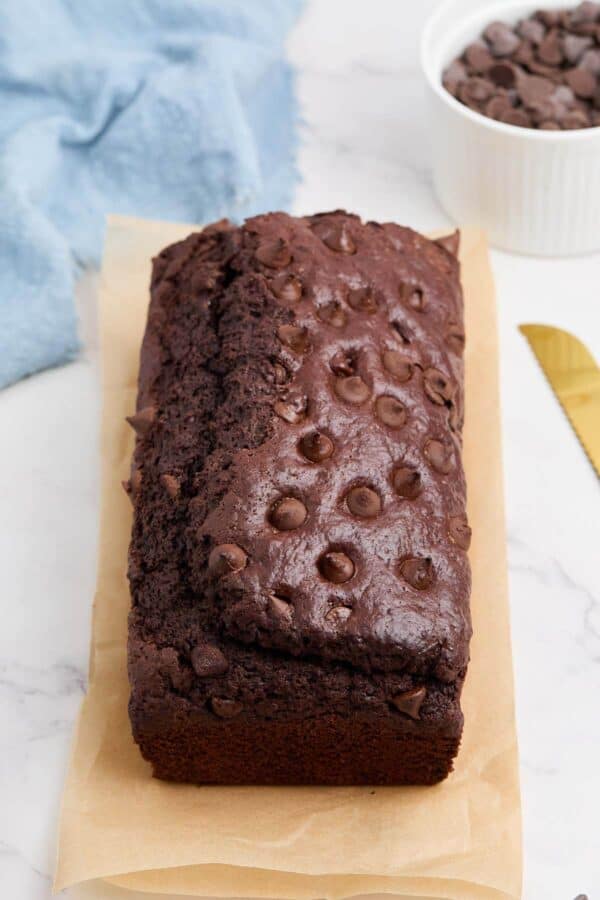 an unsliced loaf of chocolate bread