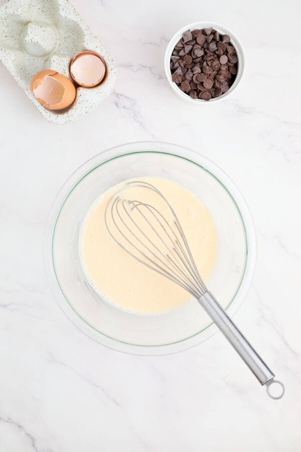 whisking eggs in a bowl