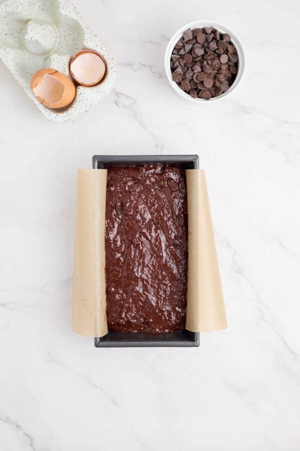 sugar free chocolate cake batter poured into a loaf tin