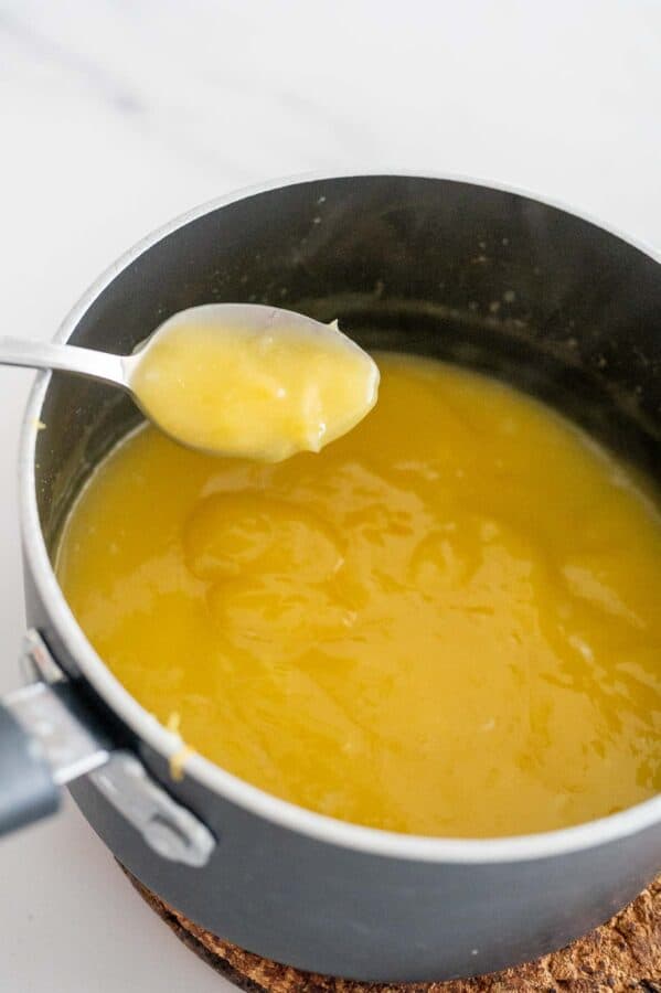 cooking lemon curd in a pot